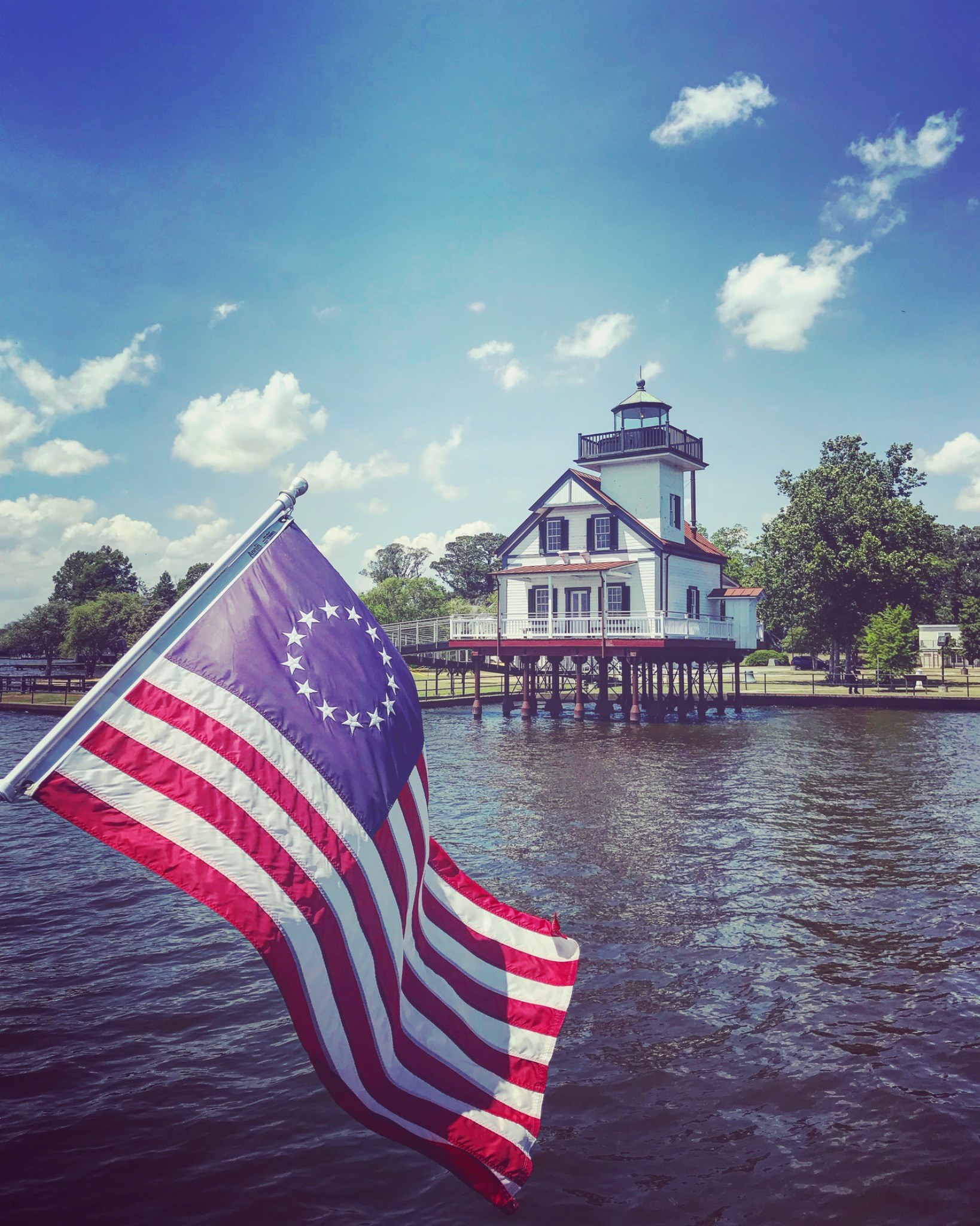 Historic lighthouse viewed from the water