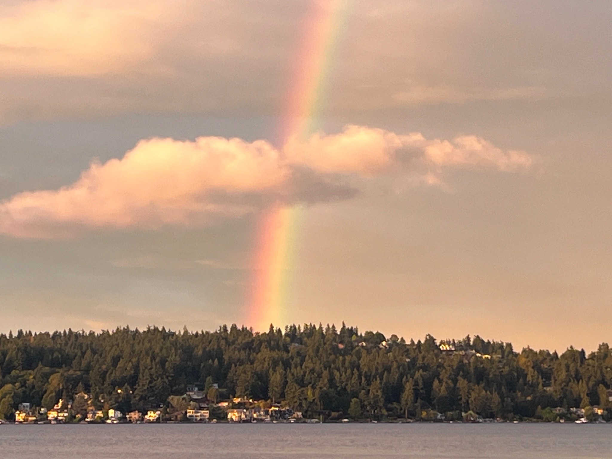 Rainbow over a waterfront community