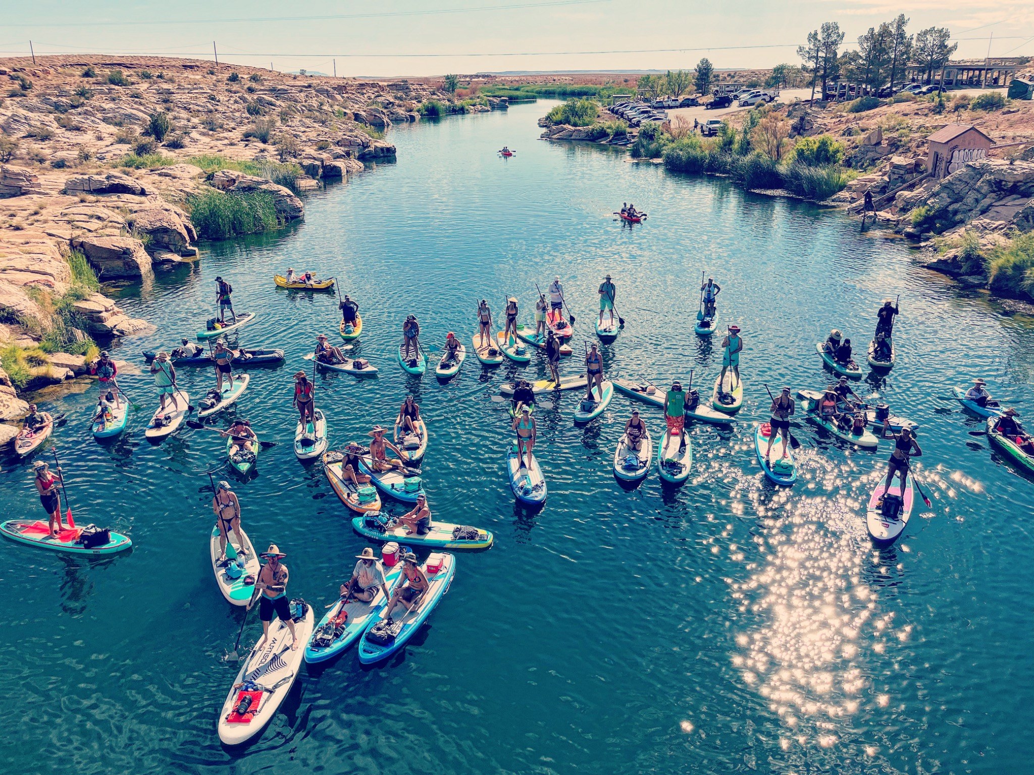 Paddleboarders gathered on the water near Winslow, Arizona